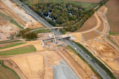 The new Brampton Road bridge (bottom) will span both the existing A1 and the new A14 – photo taken in December 2017. Credit: Highways England