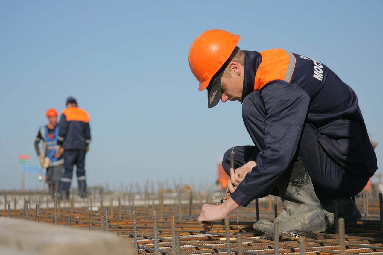 two construction workers on site
