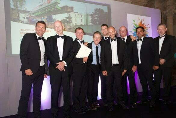 Volker team collecting their award