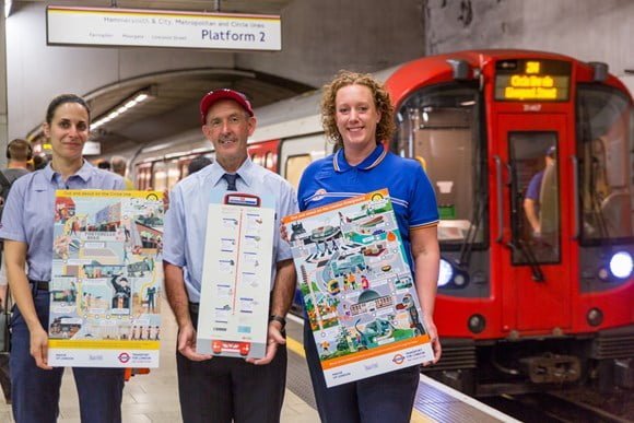 3 Londoners on a TFL platform.