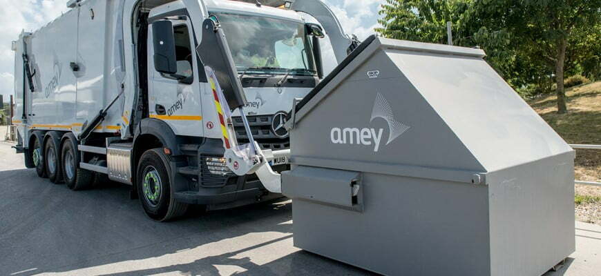 Amey truck with waste bin on front