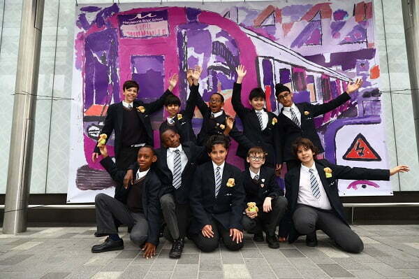 London’s Schoolchildren Turn Paddington to Abbey Wood Purple to Celebrate the Opening of Elizabeth Line