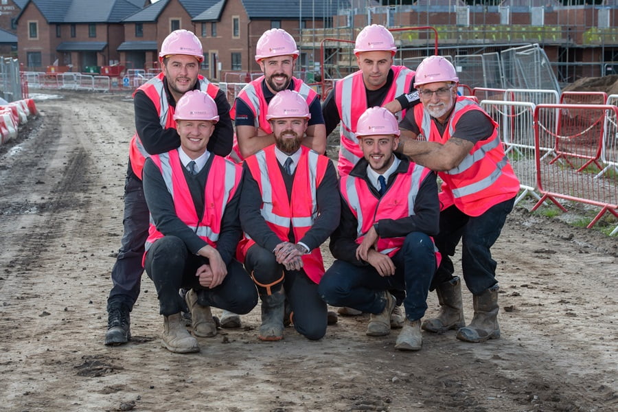 Construction staff at Barratt and David Wilson Homes in Derbyshire dressed to impress on Friday 20th October to help raise awareness for Breast Cancer Now. B&DWS - SGB-15016 - The site team in pink PPE at The Spires and Bluebell Meadows The site teams at The Spires and Bluebell Meadows developments switched out their usual hard hats and high visibility jackets for bright pink hats and vests to do their bit for the wear it pink campaign. Wear it pink was first introduced more than 20 years ago and has raised over £39 million for Breast Cancer Now. The charity helps towards funding cutting edge research across the UK and Ireland to help find a cure for breast cancer at all stages. Its mission is to make sure by 2050, everyone with breast cancer lives and is well-supported. In addition to donning the pink PPE, a donation of £200 has been made by Barratt and David Wilson Homes Sheffield to Breast Cancer Now to support its work. Gary Chambers, Managing Director at Barratt and David Wilson Homes Sheffield, said: “As a leading housebuilder, it’s extremely important to us to support charities and communities in the areas in which we build new homes. We hope our donation will support the charity to continue with its important work. “Our construction team had a lot of fun getting to wear the pink PPE for the day, and this will have sparked a lot of conversations on site to hopefully raise awareness of the campaign and Breast Cancer Now’s work.” For more information about the charity, visit the website at wear it pink. For details about any developments in the area, visit the website at Barratt Homes in Derbyshire or David Wilson Homes in Derbyshire.