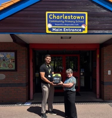 Picture of Charles Town Comminity Primary School Recieving Defibrilator