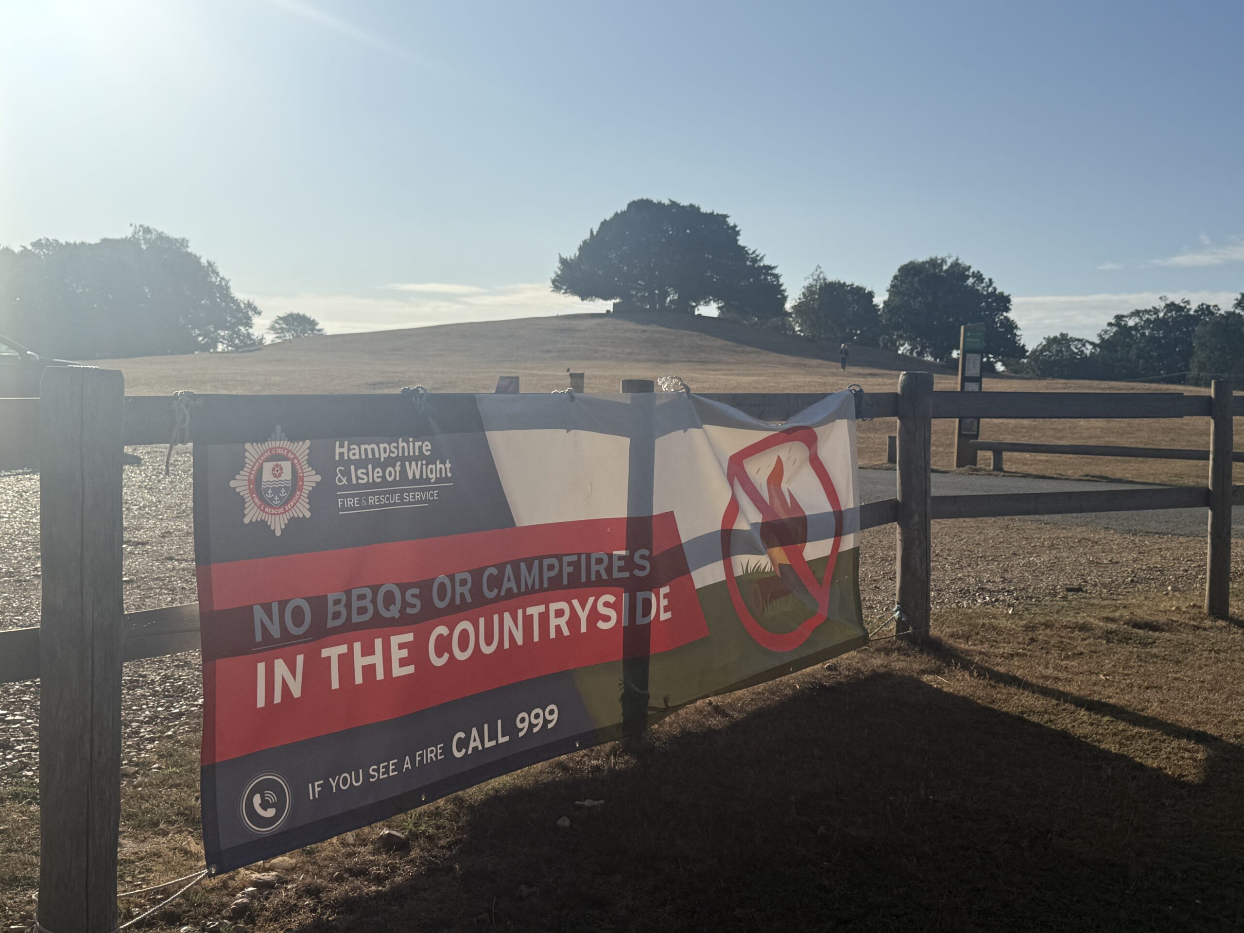 No BBQ banner on a fenced off field